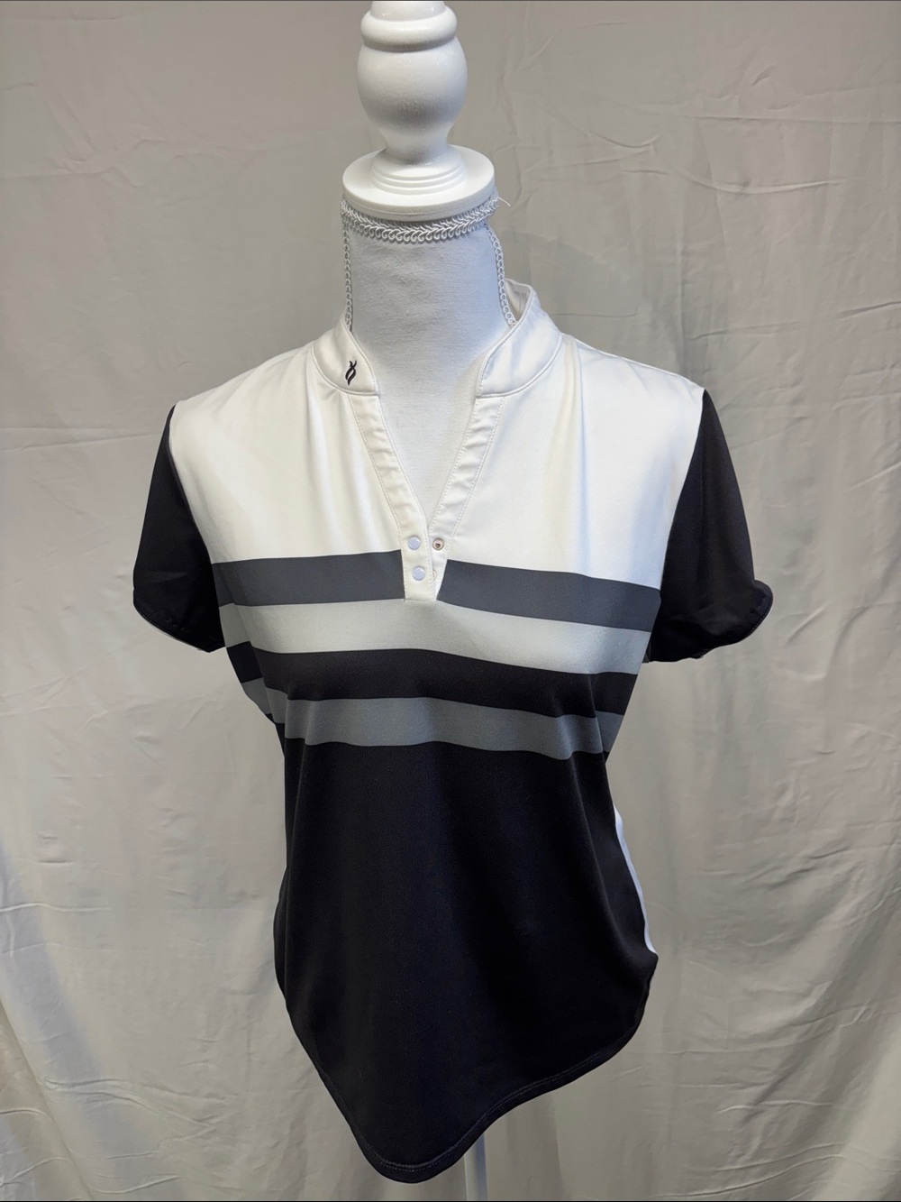 Nancy Lopez Golf Women’s Short Sleeve V-Notch Polo Tee in Black and White